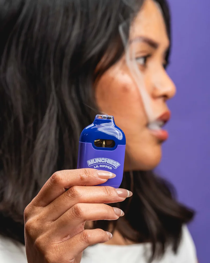 Side profile exhaling vapor